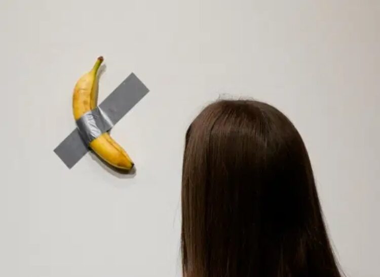 Banana taped to wall sells for $6.2 million in New York